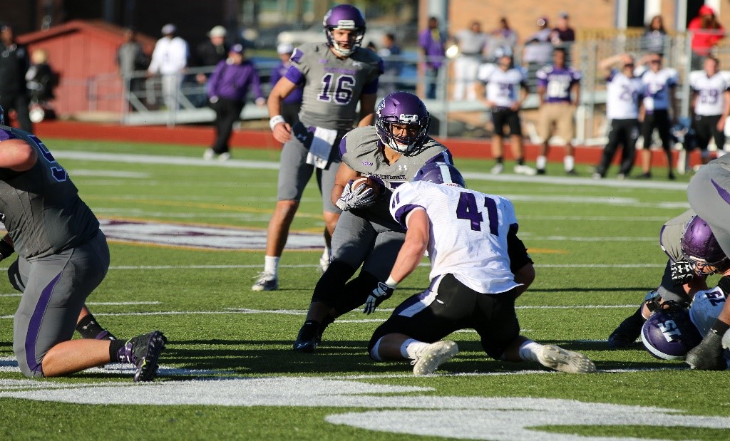Junior running back Preston Thompson looks for running room vs. Truman State this past Saturday. Thompson led the charge offensively with 131 rushing yards and a touchdown. Photo credit: Scott Stokes 
